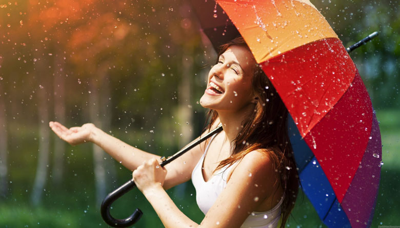 girl enjoying rain